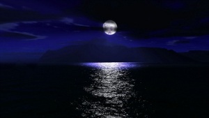 Moon going down over the sea